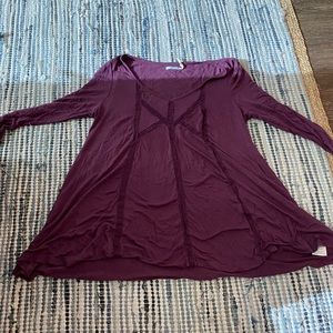 Free People. Size Medium. Purple top. Like new.